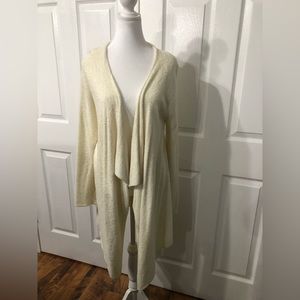 Women’s S/M polyester and rayon from bamboo blend cream colored long cardigan.